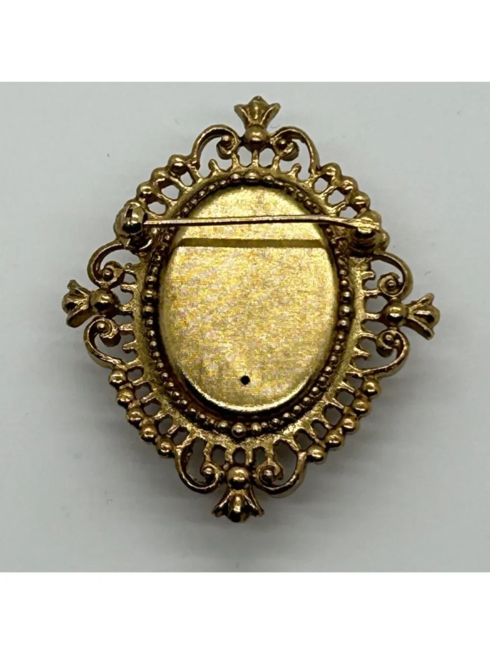 Avon this brooch